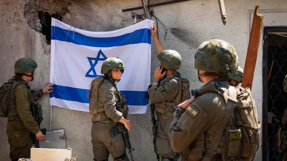 The site where a missile fired from Lebanon hit a house and cars in the northern Israeli city of Tzfat, Sept. 25, 2024. Photo by David Cohen/Flash90.