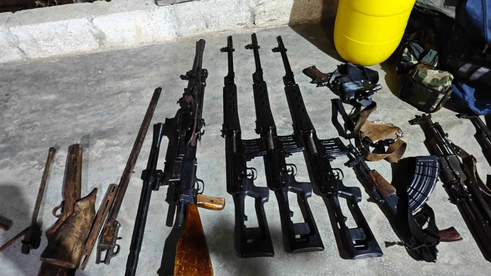 Israel Defense Forces soldiers confiscated these weapons during a raid in southern Syria to apprehend a suspected Islamic State-affiliated terrorist, December 2025. Credit: IDF.