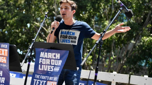 Cameron Kasky, co-founder of the student-led, gun-violence prevention group “Never Again,” speaks at the “March for Our Lives II” rally in Los Angeles against gun violence, June 11, 2022. The March for Our Lives movement was spurred by the mass shooting at Marjory Stoneman Douglas High School in Parkland, Fla., on Feb. 14, 2018. Photo by Sarah Morris/Getty Images.