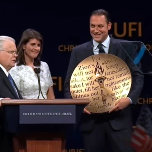 U.S. Ambassador to the United Nations Nikki Haley was presented with the “Defender of Israel” award, eliciting loud cheers from the crowd at the 13th annual Christians United for Israel summit, held from July 23-24, 2018. Screenshot: YouTube.