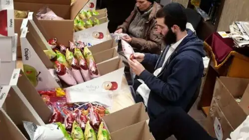 Chabad members in Kishinev, Moldova, prepare for Purim. Credit: Courtesy.
