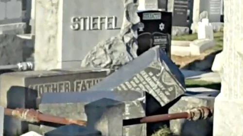 Overturned headstones at Washington Cemetery, a Jewish cemetery in Brooklyn, N.Y., in December 2010. Credit: YouTube.