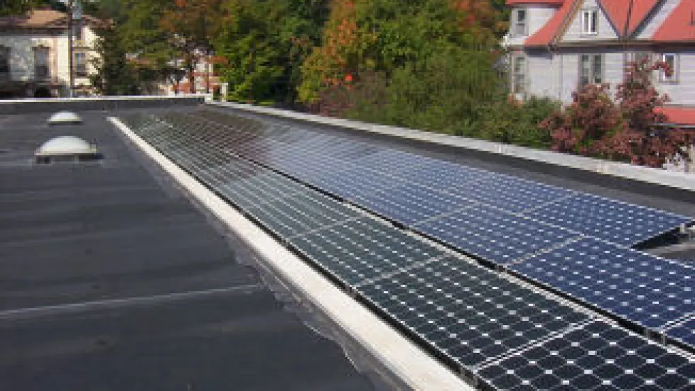 Beth El-Kesser Israel in New Haven, Conn., has a grid-tiled photovoltaic array on its synagogue roof due to the work of Rabbi Jon-Jay Tilsen and his son, Tzvi, for Tzvi's bar mitzvah project. Credit: Beth El-Kesser Israel.
