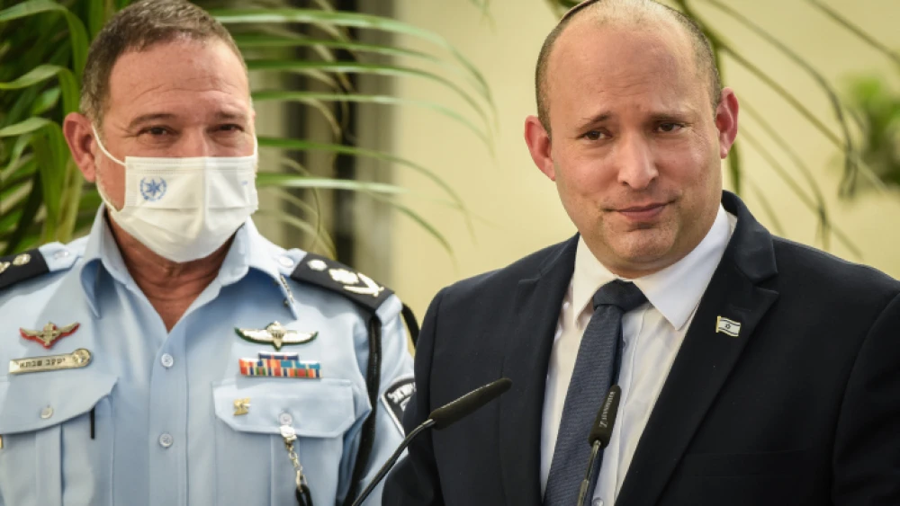 Israeli Prime Minister Naftali Bennett and Police Chief Yaakov Shabtai during an inauguration ceremony marking the opening of a new police station in Kiryat Ata, Aug. 11, 2021. Photo by Roni Ofer/Flash90.