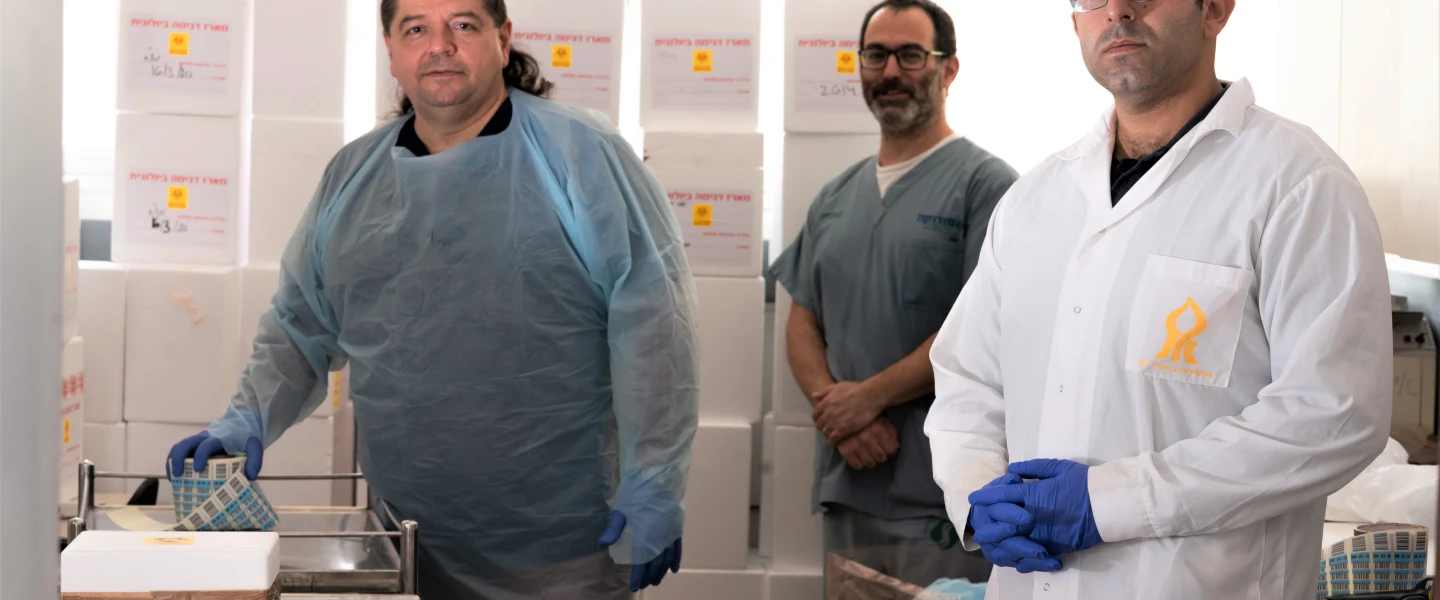 Researchers on the COVID-19 response effort at Ben-Gurion University of the Negev, from left: Professor Angel Porgador, deputy vice president for research and development; Dr. Roi Gazit; and Avishay Edrir, March 2020. Photo Credit: Dani Machlis/BGU.