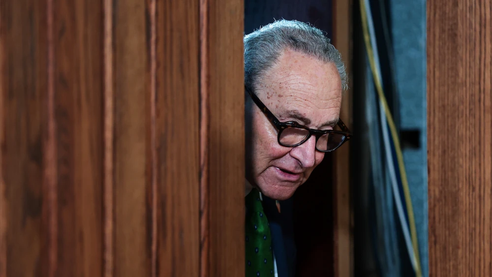 Senate Minority Leader Chuck Schumer (D-N.Y.) enters the Public Citizen's Combating Corruption forum at the National Press Club in Washington, D.C., on July 30, 2026. He called for stronger anti-corruption measures in the U.S. government by proposing a new independent Anti-Corruption Bureau. Photo by Finn Gomez/Getty Images.