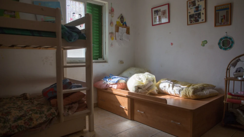 The bedroom of Hallel Yaffa Ariel, 13, in Kiryat Arba. In 2016, a 17-year-old Palestinian broke into the Ariel family home and stabbed her in her sleep, killing her. Photo by Yonatan Sindel/Flash90.