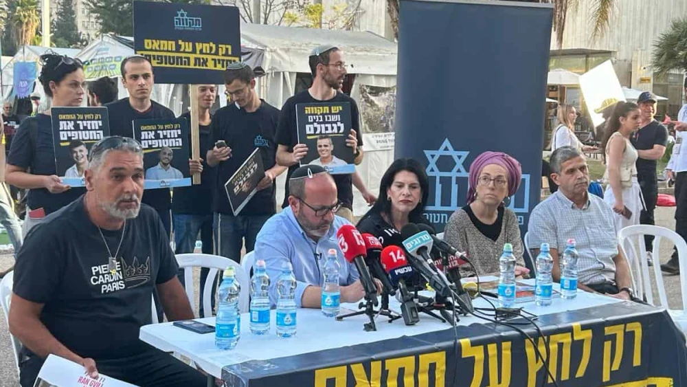 From left: Itzik Gvili, Tzvika Mor, Tali Gvili, Ditsa and Yaron Or at Hostage Square in Tel Aviv, April 3, 2024. Credit: Amelie Botbol.