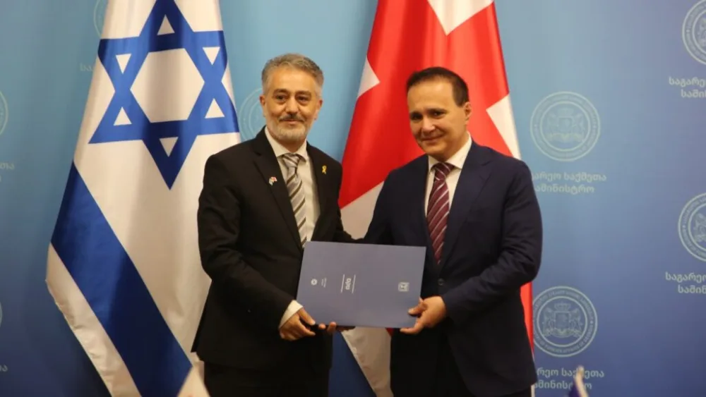 Israeli Ambassador to Georgia Walid Abu Haya presents his credentials to Zurab Darchiashvili, director of the Diplomatic Protocol Department at Georgia’s Ministry of Foreign Affairs, in Tbilisi, Aug. 22, 2025. Credit: Israeli Embassy in Georgia.