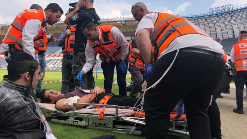 United Hatzalah emergency personnel treating a patient at a mass-casualty simulation at Teddy Stadium in Jerusalem. Photo by Eliana Rudee.