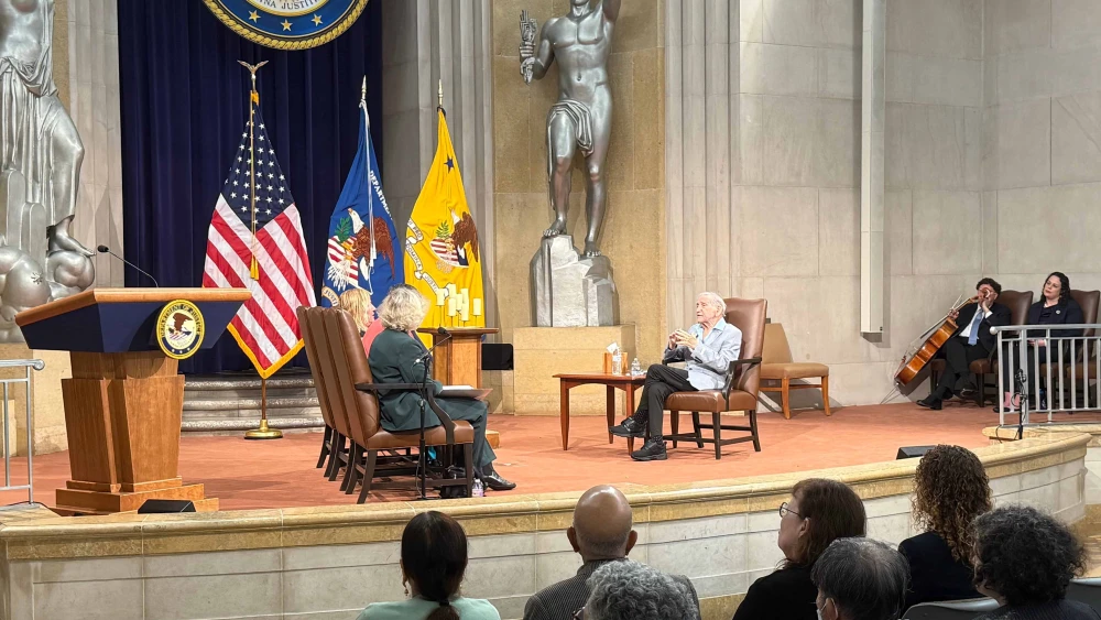 Eugene Bergman speaking at the U.S. Department of Justice, 14 May, 2025. Credit: Andrew Bernard