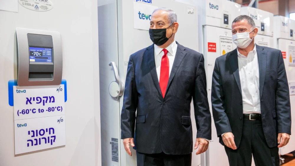 Israeli Prime Minister Benjamin Netanyahu and Health Minister Yuli Edelstein visit Teva Pharmaceutical Industries' logistics center in Shoham, where coronavirus vaccines are to be stored and distributed. Nov. 26, 2020. Photo by Yossi Aloni/Flash90.