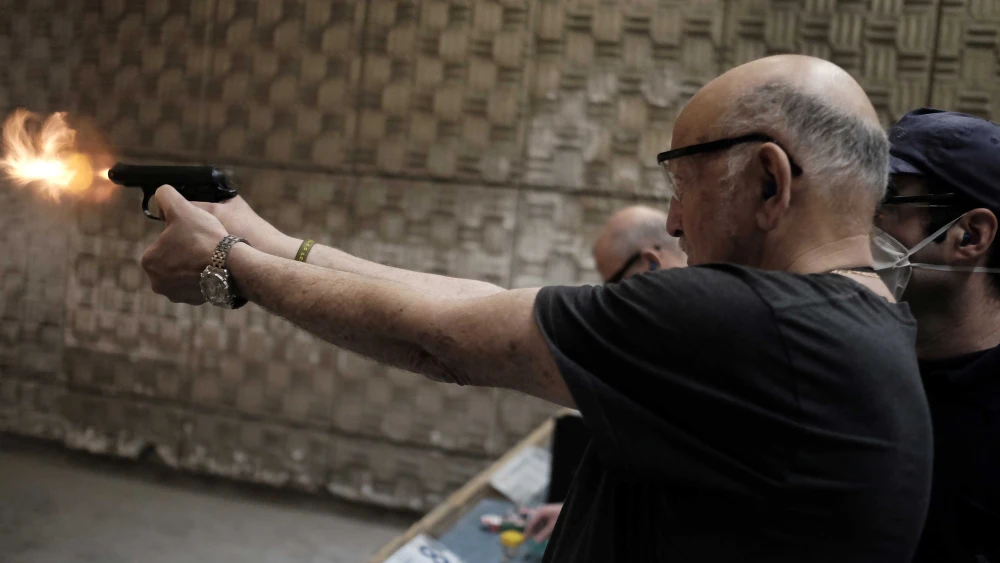 Israelis practice shooting handguns at the Olympic Shooting Range in Herzliya. Photo by Tomer Neuberg/Flash90.