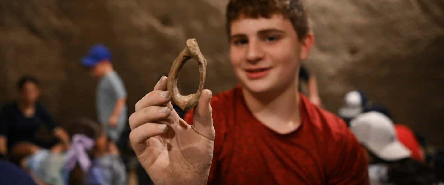 Kids participate in an archeological dig at Tel Maresha in Beit Guvrin, a UNESCO World Heritage Site in Israel’s Lachish region, Aug. 7, 2023. Photo by Yoav Dudkevitch/TPS.