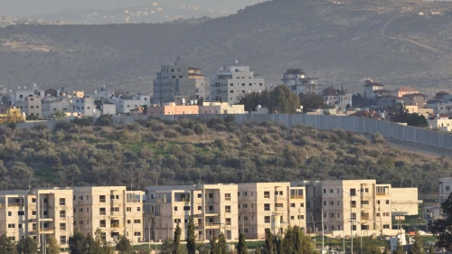 The Israeli town of Bat Hefer backdropped by the Palestinian city of Tulkarem, situated on the western edge of northern Samaria, Jan. 4, 2024. Photo by Shahar Yaari/Flash90.