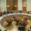 The foreign ministers of Germany, the United Kingdom, China, the United States, France, Russia, the European Union and Iran meet in Geneva on Nov. 24, 2013 for talks on the interim agreement on the Iranian nuclear program. Credit: U.S. Department of State.