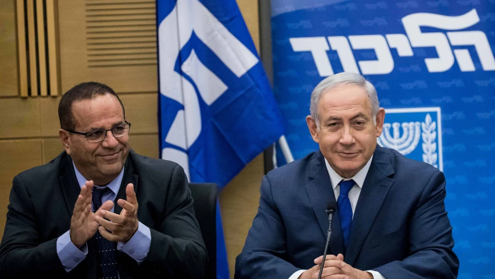 Then-Communications Minister Ayoob Kara with Prime Minister Benjamin Netanyahu at a Likud Party faction meeting at the Knesset on June 25, 2018. Photo by Yonatan Sindel/Flash90.