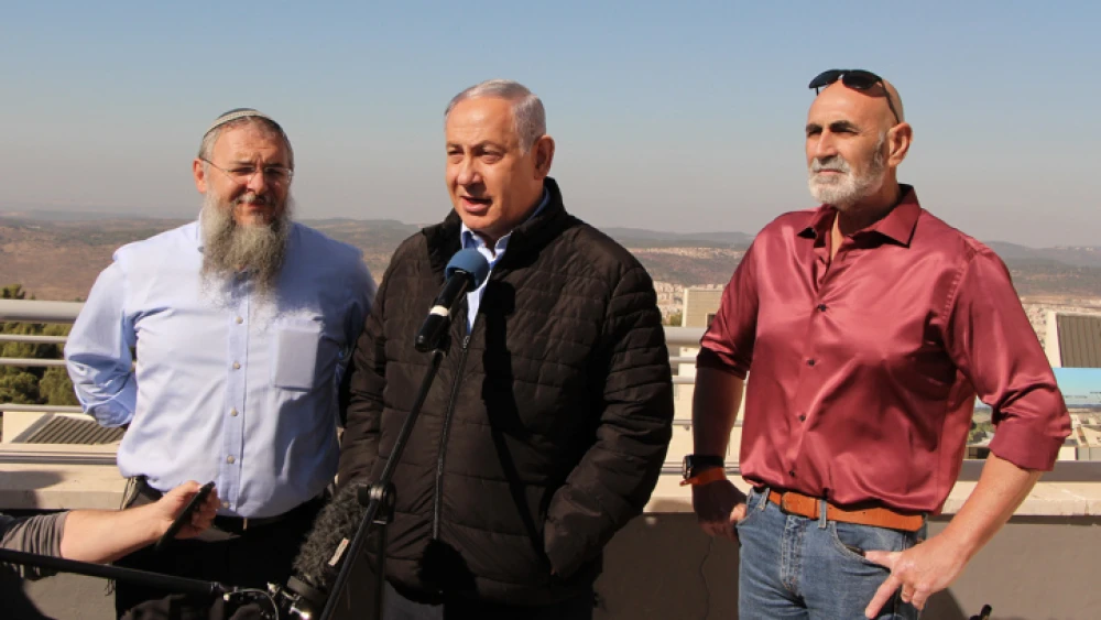 Israeli Prime Minister Benjamin Netanyahu, Gush Etzion Regional Council chairman Shlomo Ne'eman and Jordan Valley Regional Council chairman David Elchiani visit Alon Shvut in Gush Etzion on Nov. 19, 2019. Photo by Gershon Elinson/Flash90.