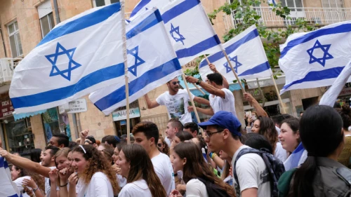 High school students from Yavne celebrate on the streets of central Jerusalem before the flag march of Jerusalem Day, on May 13, 2018. Photo by Nati Shohat/Flash90.