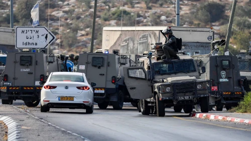 Israeli security forces stand guard at the scene of a shooting attack, near Tarqumiyah, in Judea, Sept. 1, 2024. Photo by Wisam Hashlamoun/Flash90.