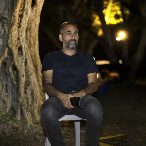 Avihai Brodutch waits for his wife and three kids held by Hamas in Gaza. Photo by Rina Castelnuovo.