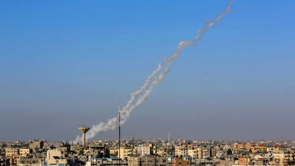Smoke trails are seen as a rocket is launched at Israel from Rafah in the southern Gaza Strip on May 4, 2019. Photo by Abed Rahim Khatib/Flash90.