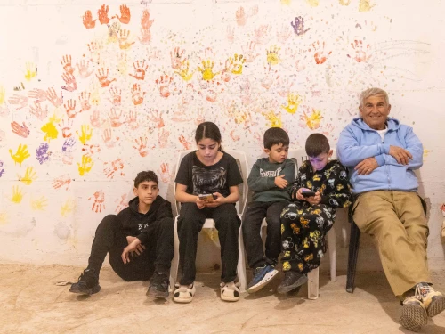 Israelis take cover at a public bomb shelter as siren warns of incoming missiles fired from Iran, at Moshav Pedaya, southeast of Rehovot, Feb. 28. 2026. Photo by Yossi Aloni/Flash90.