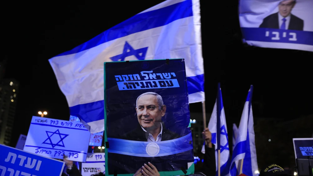 Supporters of Israeli Prime Minister Benjamin Netanyahu show their support near the Supreme Court in Jerusalem, Dec. 11, 2019. Photo by Olivier Fitoussi/Flash90.