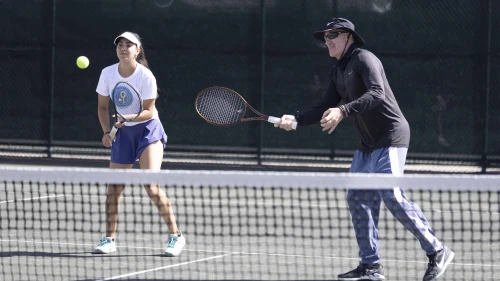 Inbar Poni from Ramat Hasharon, Israel, plays alongside legendary tennis coach Brad Gilbert at St. Andrews Country Club in Boca Raton, Fla. Credit: Courtesy of the Israel Tennis and Education Centers.