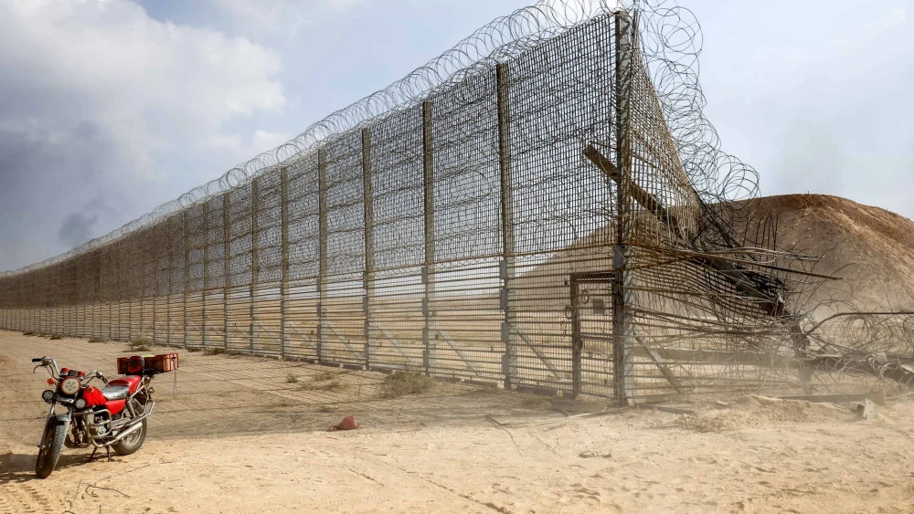 A gap in the Gaza border fence created by invading terrorists on Oct. 7, 2023. Photo by Abed Rahim Khatib/Flash90.