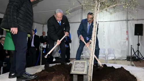 Israeli Prime Minister Benjamin Netanyahu leads a tree-planting ceremony in honor of Tu Bishvat in the Neve Ya'akov neighborhood of Jerusalem, Feb. 6, 2023. Credit: Amos Ben-Gershom/GPO.