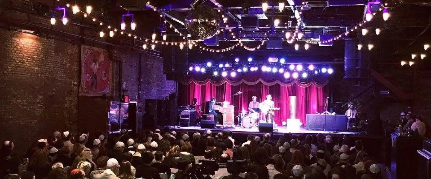 The High Holiday services, often called “Bowl Hashanah,” are hosted by Friday Night Jams/Because Jewish and will be led by Rabbi Daniel Brenner; Jeremiah Lockwood (musical coordinator); vocalist and bass player Yula Beeri; and trumpeter and Antibalas charter member Jordan McLean. Credit: BecauseJewish.com.