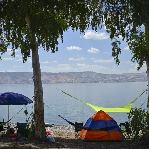 Israelis prepare for a long weekend at the Sea of Galilee at Halukim Beach, Oct. 1, 2025. Photo by Michael Giladi/Flash90.