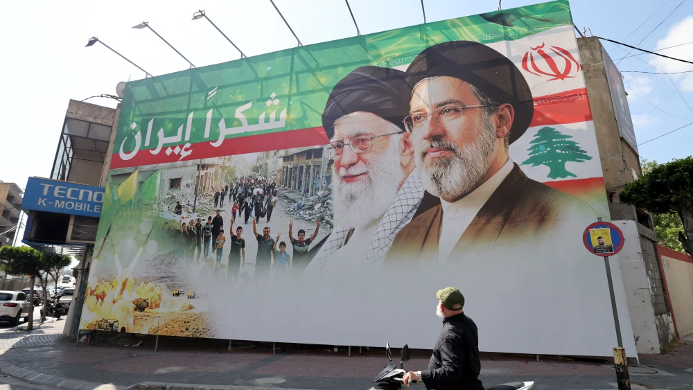 A billboard depicting the late Iranian Supreme Leader Ali Khamenei and his successor, Mojtaba Khamenei, alongside the Arabic message “Thank you, Iran,” in Beirut’s southern suburbs, June 15, 2026. Photo by Anwar Amro/AFP via Getty Images.