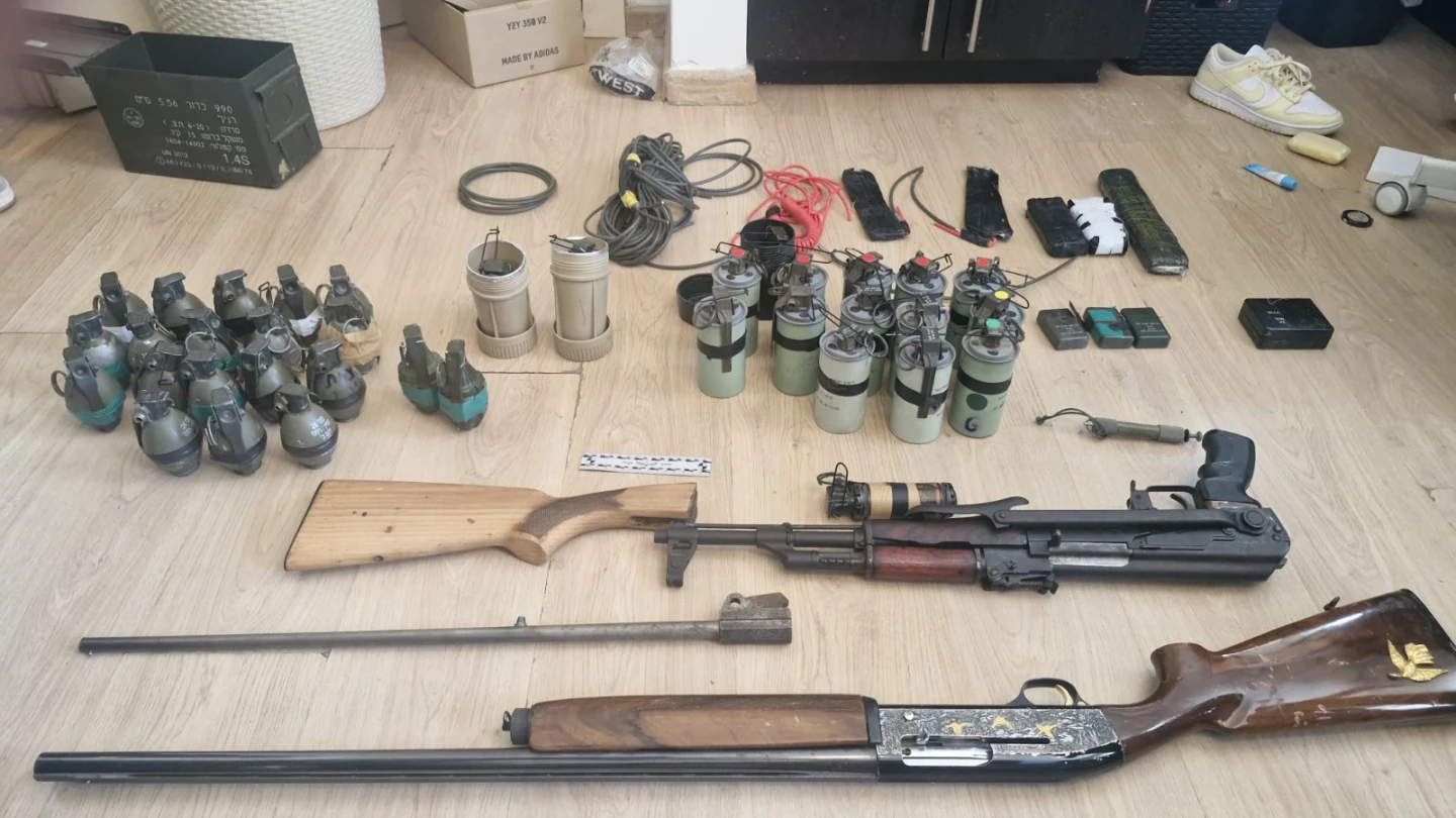 Weapons seized during a raid on an apartment building in Jerusalem, July 4, 2026. Credit: Israel Police's Spokesperson's Unit.