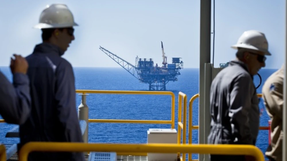 Workers seen at the Tamar gas field off the northern coast of Israel. Credit: Moshe Shai/Flash90.