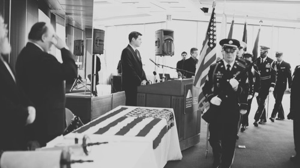 Click photo to download. Caption: The color guard marches during an Oct. 12 dedication of a Torah scroll for the U.S. military at the Museum of Jewish Heritage in Manhattan. At the podium is Jacob Kamaras, and at left giving a salute is his father, Philip Kamaras. Credit: Alexa Drew Photography.