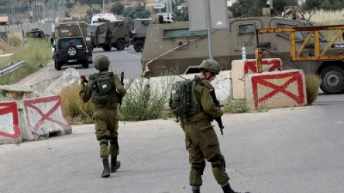 Israeli soldiers at the scene of a car-ramming attack near the Hebron Hills, May 14, 2020. Photo by Wisam Hashlamoun/Flash90.