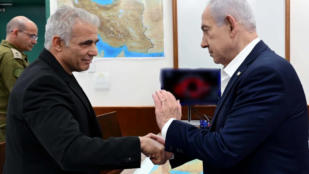 Israeli Prime Minister Benjamin Netanyahu meets opposition leader Yair Lapid (Yesh Atid Party) for a security briefing, June 17, 2025. Photo by Avi Ohayon/GPO.