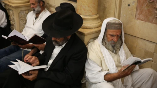 Jews pray at Meron on the eve of Tisha B'Av, on Aug. 10, 2019. Photo by David Cohen/Flash90.