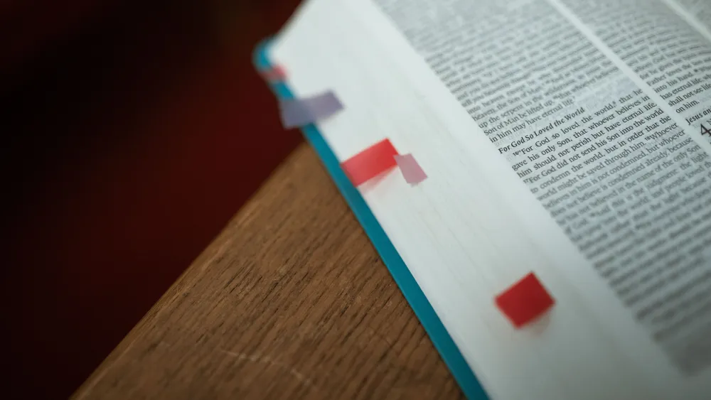 An open bible on a desk. Credit: RDNE Stock project/Pexels.