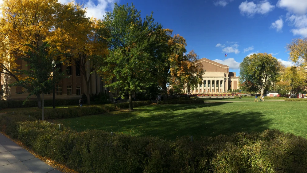 Northrop Mall at the University of Minnesota campus in Minneapolis, with Walter Library on the left and Cyrus Northrop Auditorium on the right. Credit: Wikimedia Commons.