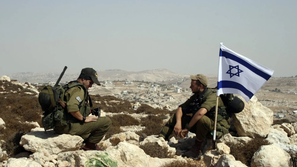 Israel security personnel near Eitam Farm in the Gush Etzion region of Judea, Oct. 11, 2009. Photo by Gershon Elinson/Flash90.