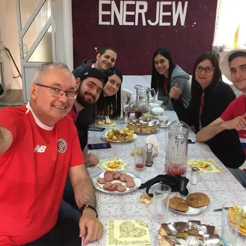 Soccer fans enjoy a kosher meal at the Chabad Jewish community center in Samara, Russia. (Credit: Chabad.org/News)