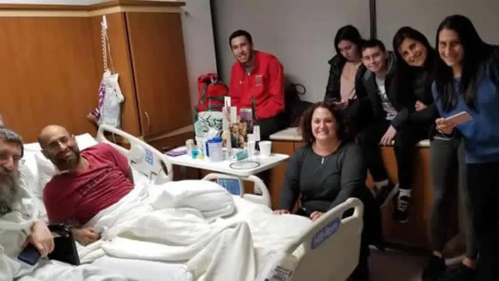 Simon, Levitz and members of Levitz’s family two days after the surgery. Credit: Chabad.org/News.