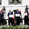 Israeli Prime Minister Benjamin Netanyahu, U.S. President Donald Trump, UAE Foreign Minister Abdullah bin Zayed Al Nahyan and Bahraini Foreign Minister Abdullatif bin Rashid Al Zayani hold up the Abraham Accords, during the signing ceremony at the White House, Sept. 15, 2020. Photo by Avi Ohayon/GPO.