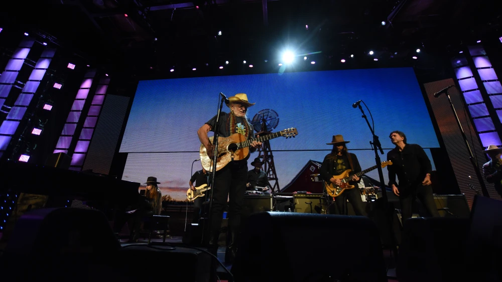 The Willie Nelson and Family band, with Mickey Raphael on harmonica. Credit: Courtesy of Farm Aid.