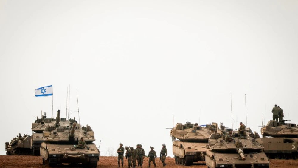 Israeli soldiers at a staging area near the Israel-Gaza border, Oct. 9, 2023. Photo by Chaim Goldberg/Flash90.