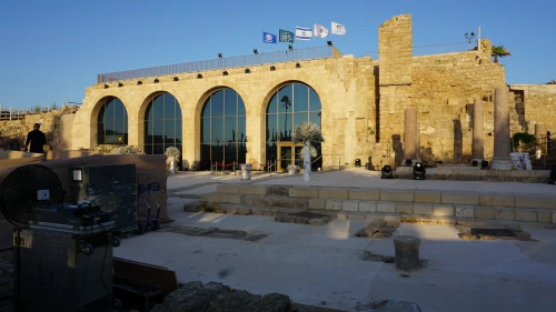 The new Visitor Center in Caesarea combines artifacts with innovative displays, including a 10-minute film telling the story of Herod and the building of Caesarea projected vertically onto one of the huge vault walls, May 2019. Photo by Judy Lash Balint.
