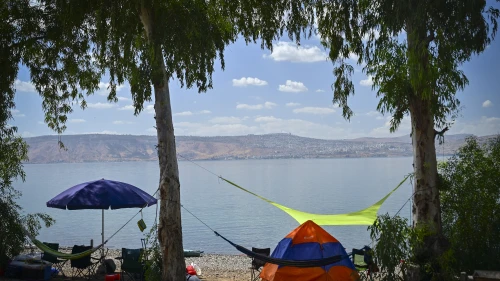 Israelis prepare for a long weekend at the Sea of Galilee at Halukim Beach, Oct. 1, 2025. Photo by Michael Giladi/Flash90.